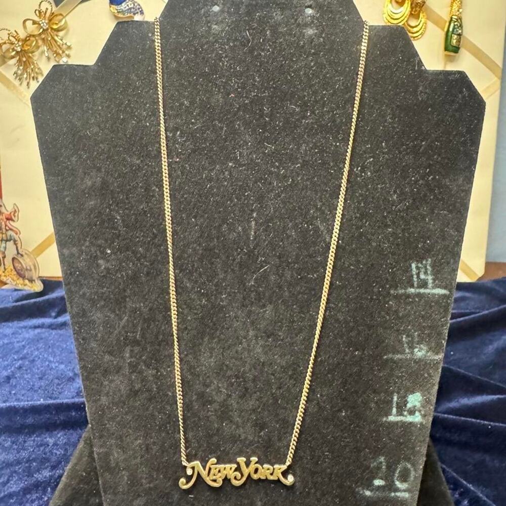 New york gold tone necklace
